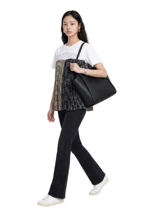 The same printed tee worn with a black skirt and flats.